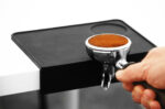 Angled silicone espresso tamper base